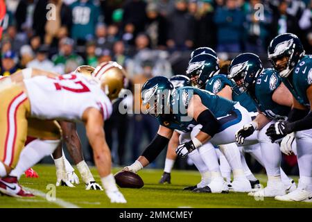 San Francisco 49ers center Jason Poe, left, and Minnesota Vikings