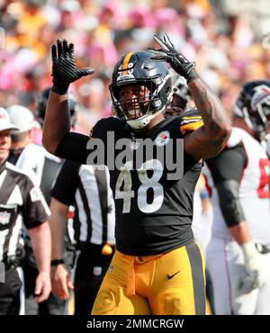 Atlanta Falcons linebacker Bud Dupree (48) works during the first half of  an NFL preseason football game against the Cincinnati Bengals, Friday, Aug.  18, 2023, in Atlanta. The Cincinnati Bengals and the