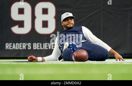 Dallas Cowboys' Dak Prescott (4) wears a cap styled with the Salute To  Service campaign logo as he warms up before an NFL football game against  the Kansas City Chiefs on Sunday, Nov. 5, 2017, in Arlington, Texas. (AP  Photo/Brandon Wade Stock Photo