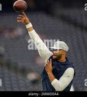 Dallas Cowboys quarterback Dak Prescott wears a Crucial Catch hat