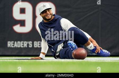 Dallas Cowboys quarterback Dak Prescott wears a Crucial Catch hat as he  warms up for an NFL football game against the Houston Texans, Sunday, Oct.  7, 2018, in Houston. (AP Photo/David J.