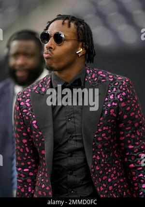 Dallas Cowboys defensive end Taco Charlton (97) watches the team work out  from the sideline at the team's NFL football training facility in Frisco,  Texas, Tuesday, June 11, 2019. (AP Photo/Tony Gutierrez