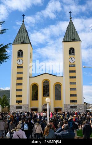 Procession of people towards the St James Church on Palm Sunday in Medjugorje, Bosnia and Herzegovina. Stock Photo