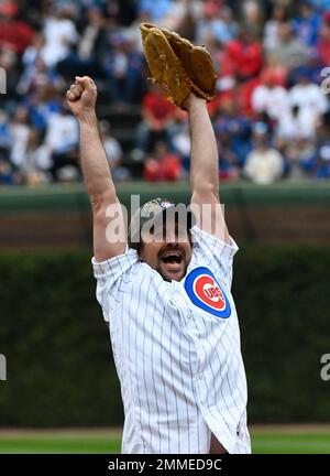 Henry Rowengartner, an actor from the film Rookie of the Year, prepares  to throw out a ceremonial first pitch before a baseball game between the  St. Louis Cardinals and the Chicago Cubs