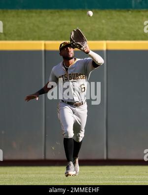 Milwaukee, USA. August 24, 2018: Pittsburgh Pirates center fielder Starling  Marte #6 along with the Brewer infielders watch the review challenge on the  jumbo screen of Martes stolen base in the 11th