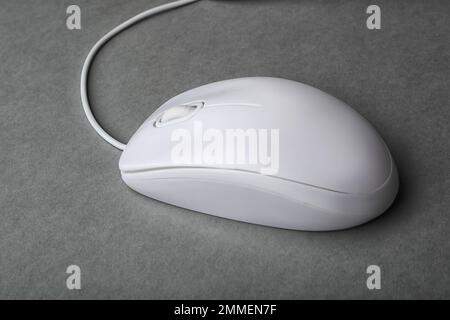 Modern wired computer mouse on grey background Stock Photo