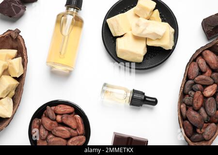 Composition with organic cocoa butter on white background, top view Stock Photo