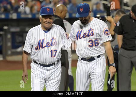 Former Major Leaguer Ozzie Virgil leaves the field after throwing out the  first pitch before a New York Mets baseball game against the Atlanta Braves  Wednesday, Sept. 26, 2018, in New York.