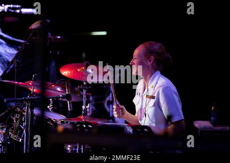 Unit leader Chief Musician Tina Catalanotto, from Slidell, La., plays drums during U.S. Navy Band Country Current's final performance on their 2022 national tour at the Dailey and Vincent American Made Music Festival in Hiawassee, Ga. Stock Photo