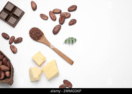 Composition with organic cocoa butter on white background, top view Stock Photo