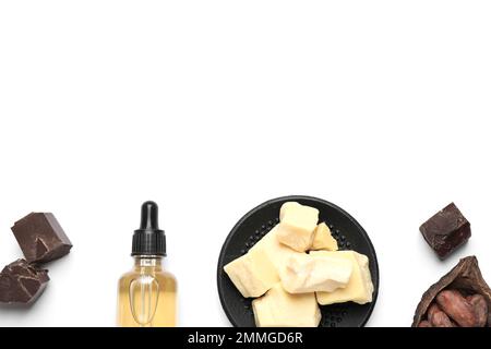 Composition with organic cocoa butter on white background, top view Stock Photo