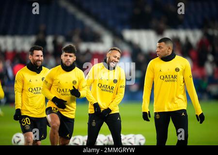 Paris, France. 29th Jan, 2023. Paris Saint-Germain's Neymar Jr (2nd R), Kylian Mbappe (1st R) and Lionel Messi (1st L) warm up prior to the French Ligue 1 football match between Paris Saint-Germain FC and Stade de Reims in Paris, France, Jan. 29, 2023. Credit: Glenn Gervot/Xinhua/Alamy Live News Stock Photo