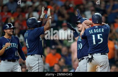 Seattle Mariners' Eugenio Suarez bats against the Cleveland Guardians  during the third inning of a baseball game, Sunday, April 9, 2023, in  Cleveland. (AP Photo/Ron Schwane Stock Photo - Alamy