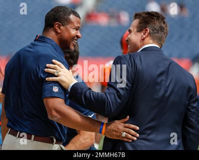 Former Denver Broncos defensive player Bill Romanowski looks on