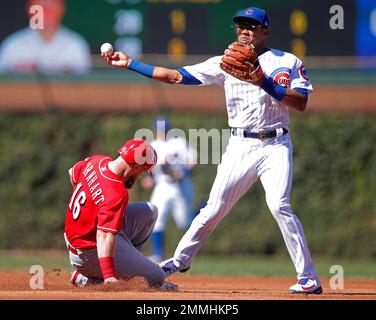 Chicago Cubs Addison Russell makes a catch on a pop up off the bat of St.  Louis Cardinals Magneuris Sierra while Javier Baez waits as a backup in the  sixth inning at