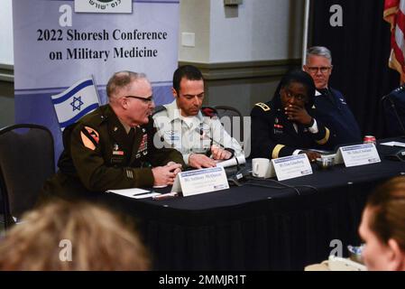 Brig. Gen. Anthony McQueen, commanding general of U.S. Army's Medical Research and Development Command (MRDC), speaks during a panel presentation at the 20th biennial Shoresh Military Medicine Conference in Rockville, Maryland, Sept. 19, 2022. Stock Photo