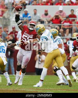 Texas Longhorns running back Keaontay Ingram (26) is stopped behind the  line by Oklahoma defensive lineman Kenneth Mann (55) during the Dr. Pepper  Big-12 Championship between the Oklahoma Sooners vs Texas Longhorns