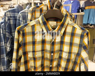 Indian men latest fashion shirts in display retail shop in market