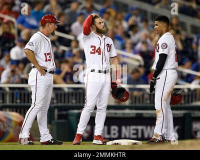 Washington Nationals left fielder Bryce Harper (34) warms up prior to the  start of their game against the Milwaukee Brewers at N Stock Photo - Alamy