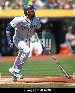 Seattle Mariners' Nelson Cruz holds his bat in the dugout during the fifth  inning of a baseball game against the Los Angeles Angels Saturday, April 8,  2017, in Anaheim, Calif. (AP Photo/Jae