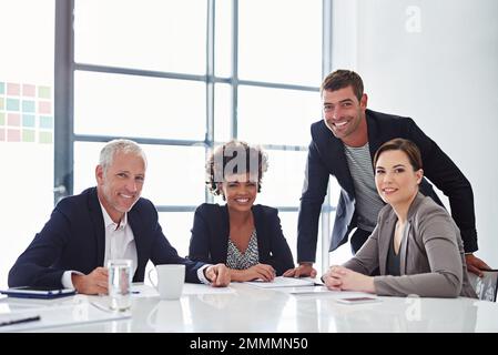 Were the team you need. Cropped portrait of a group of businesspeople meeting in the boardroom. Stock Photo