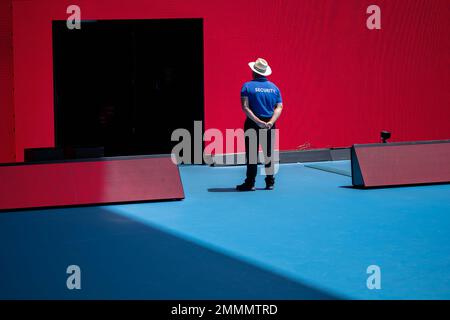 public event with security guards on court at the tennis in melbourne australia in summer Stock Photo