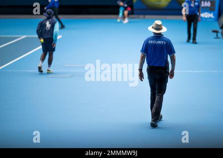 public event with security guards on court at the tennis in melbourne australia in summer Stock Photo