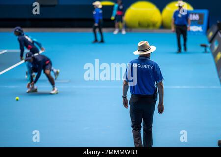 public event with security guards on court at the tennis in melbourne australia in summer Stock Photo