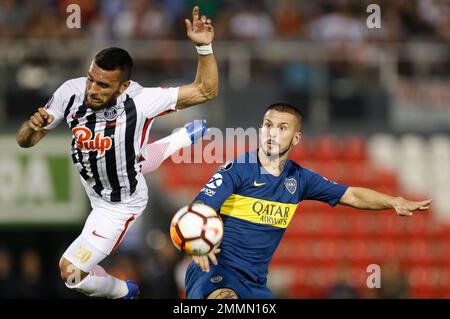 Ivan Piris of Paraguay's Libertad heads the ball during a Copa Libertadores  Group G soccer match against Brazil's Athletico Paranaense at Defensores  del Chaco stadium in Asuncion, Paraguay, Thursday, May 4, 2023. (