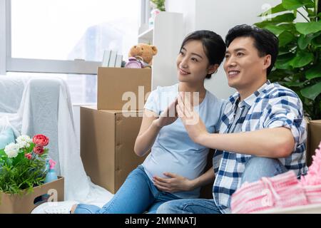 The young couple moved into a new home Stock Photo