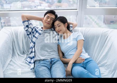 The young couple moved into a new home Stock Photo