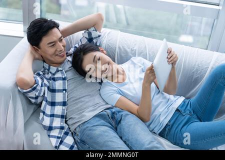 The young couple moved into a new home Stock Photo