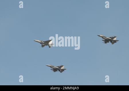 NAKHON PATHOM, THAILAND - January 14, 2023 : stunt flying, the performance of aerial feats Military F16 fighter jet and T-50 Golden Eagle fighter jet Stock Photo