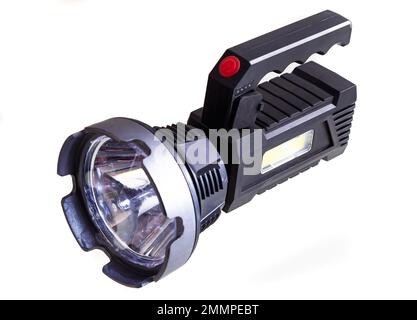 A hand held flashlight isolated on a white background. Stock Photo
