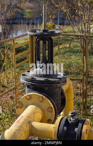 Manual valve to control the flow of gas in the process. Stock Photo