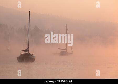 Sunrise over Foggy Lake in Tahoe National Forest - Donner Lake - California Stock Photo