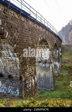 Old stone arched bridge-viaduct, Ternopil region, Ukraine. Stock Photo