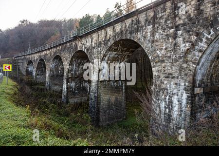 Old stone arched bridge-viaduct, Ternopil region, Ukraine. Stock Photo