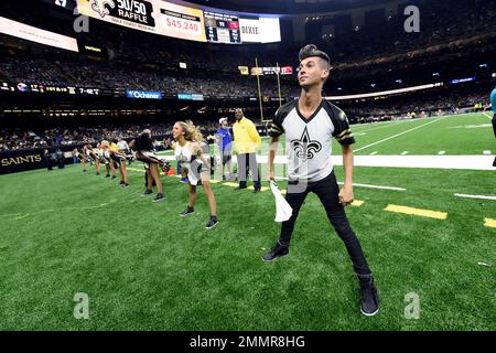 Jesse Hernandez, the first male member of the New Orleans Saints dance team  'The Saintsations,' performs in the second half of an NFL preseason  football game against the Arizona Cardinals in New