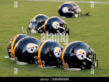 Philadelphia Eagles helmets sit on the field before an NFL