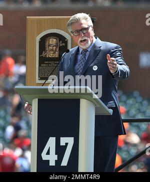 Minnesota Twins pitcher Jack Morris (47) congratulates catcher Brian Harper  (12) at the plate after Harper tagged out Braves Terry Pendleton at for the  second play at the plate in the fifth