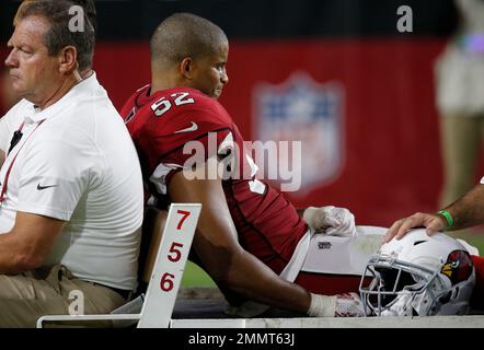 Arizona Cardinals linebacker Jeremy Cash 52 leaves the field after being injured during the second half of a preseason NFL football game against the Los Angeles Chargers Saturday Aug. 11 2018 in