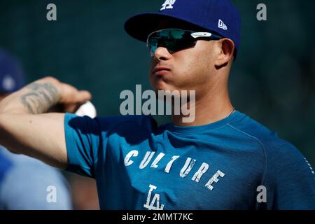 Milwaukee, WI, USA. 20th July, 2018. Los Angeles Dodgers shortstop Manny  Machado #8 is all smiles as he joins his new team just after the All-Star  break. Machado is seen here during