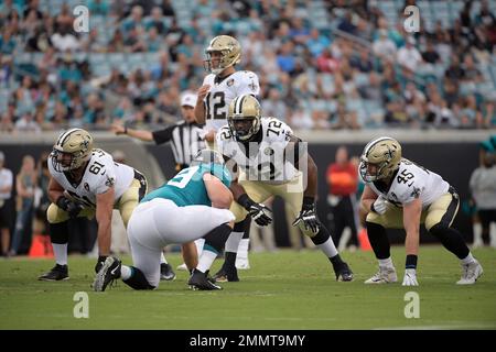 Jacksonville Jaguars defensive lineman Calais Campbell (93) and defensive  end Hunter Dimick (79) walk to the field before an NFL football practice,  Friday, May 26, 2017, in Jacksonville, Fla. (AP Photo/John Raoux