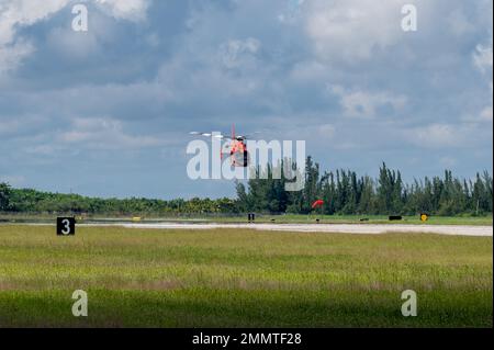 United States Coast Guard MH-65 Dolphin helicopter from Coast Guard Air Station Miami, training at Homestead ARB. Stock Photo