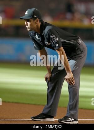 MLB umpire Gabe Morales (47) in the first inning during a baseball game  between the San Francisco Giants and the Arizona Diamondbacks, Sunday, Aug.  5, 2018, in Phoenix. (AP Photo/Rick Scuteri Stock