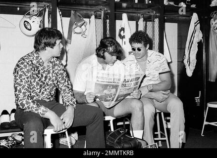 New York Jets John Riggins goes through the motions of a fake handoff  during training session at Rikers Island in New York City, Sept. 26, 1973.  He arrived for training sporting a