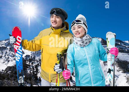 The young couple ski Stock Photo