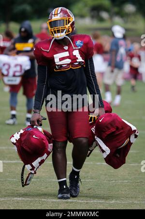 Washington Redskins linebacker Shaun Dion Hamilton (51) carries teammates  gear after the morning session of the Redskins NFL football training camp  in Richmond, Va., Wednesday, Aug. 1, 2018. (AP Photo/Steve Helber Stock  Photo - Alamy