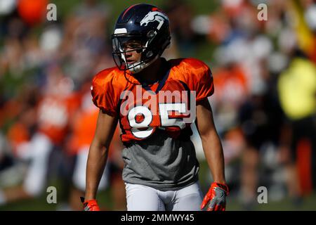 Landover, USA. August 24, 2018: Washington Redskins cornerback Prince  Charles Iworah (47) breaks up a pass intended for Denver Broncos wide  receiver Mark Chapman (85) during the NFL preseason game between the